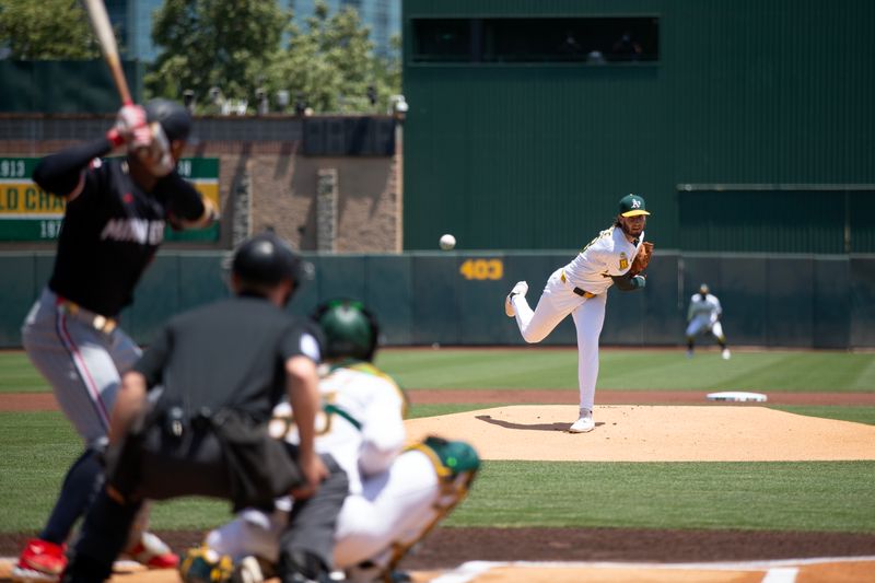 Jun 5, 2025; West Sacramento, California, USA; Athletics starting pitcher Mitch Spence (28) delivers a pitch against the Minnesota Twins during the first inning at Sutter Health Park. Mandatory Credit: D. Ross Cameron-Imagn Images