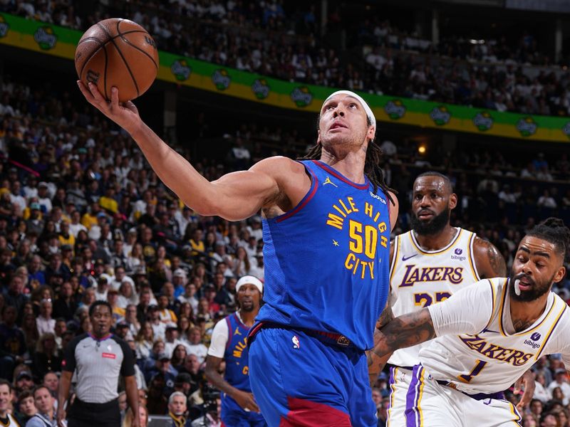 DENVER, CO - APRIL 20: Aaron Gordon #50 of the Denver Nuggets drives to the basket during the game against the Los Angeles Lakers during Round 1 Game 1 of the 2024 NBA Playoffs on April 20, 2024 at the Ball Arena in Denver, Colorado. NOTE TO USER: User expressly acknowledges and agrees that, by downloading and/or using this Photograph, user is consenting to the terms and conditions of the Getty Images License Agreement. Mandatory Copyright Notice: Copyright 2024 NBAE (Photo by Garrett Ellwood/NBAE via Getty Images)