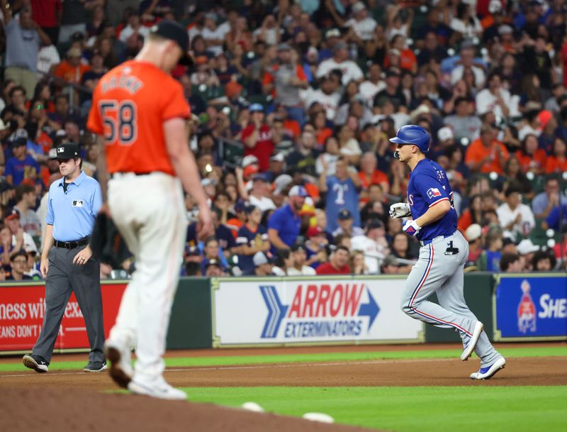 Jul 12, 2024; Houston, Texas, USA; Texas Rangers shortstop Corey Seager (5) rounds the bases after hitting a two run home run against Houston Astros starting pitcher Hunter Brown (58) in the sixth inning at Minute Maid Park. Mandatory Credit: Thomas Shea-USA TODAY Sports