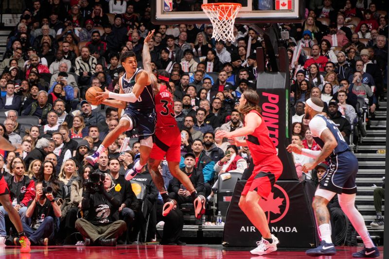 TORONTO, CANADA - FEBRUARY 28: Josh Green #8 of the Dallas Mavericks passes the ball during the game against the Toronto Raptors on February 28, 2024 at the Scotiabank Arena in Toronto, Ontario, Canada.  NOTE TO USER: User expressly acknowledges and agrees that, by downloading and or using this Photograph, user is consenting to the terms and conditions of the Getty Images License Agreement.  Mandatory Copyright Notice: Copyright 2024 NBAE (Photo by Mark Blinch/NBAE via Getty Images)