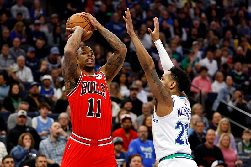 MINNEAPOLIS, MINNESOTA - MARCH 31: DeMar DeRozan #11 of the Chicago Bulls shoots against Monte Morris #23 of the Minnesota Timberwolves in the first quarter at Target Center on March 31, 2024 in Minneapolis, Minnesota. NOTE TO USER: User expressly acknowledges and agrees that, by downloading and or using this photograph, User is consenting to the terms and conditions of the Getty Images License Agreement. (Photo by David Berding/Getty Images)