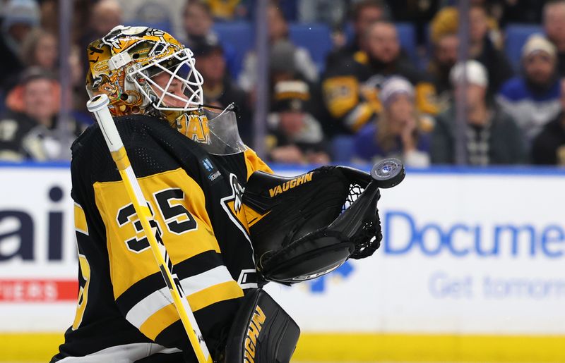 Dec 9, 2022; Buffalo, New York, USA;  Pittsburgh Penguins goaltender Tristan Jarry (35) looks to make a glove save during the second period against the Buffalo Sabres at KeyBank Center. Mandatory Credit: Timothy T. Ludwig-USA TODAY Sports