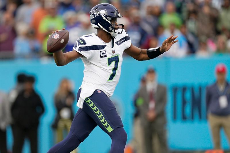 Seattle Seahawks quarterback Geno Smith (7) looks to throw a pass during the second half of an NFL football against the Tennessee Titans, game Sunday, Dec. 24, 2023, in Nashville, Tenn. (AP Photo/George Walker IV)