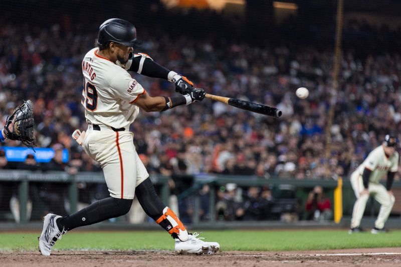 May 15, 2024; San Francisco, California, USA; San Francisco Giants center fielder Luis Matos (29) hits an RBI single against the Los Angeles Dodgers during the eighth inning at Oracle Park. Mandatory Credit: John Hefti-USA TODAY Sports