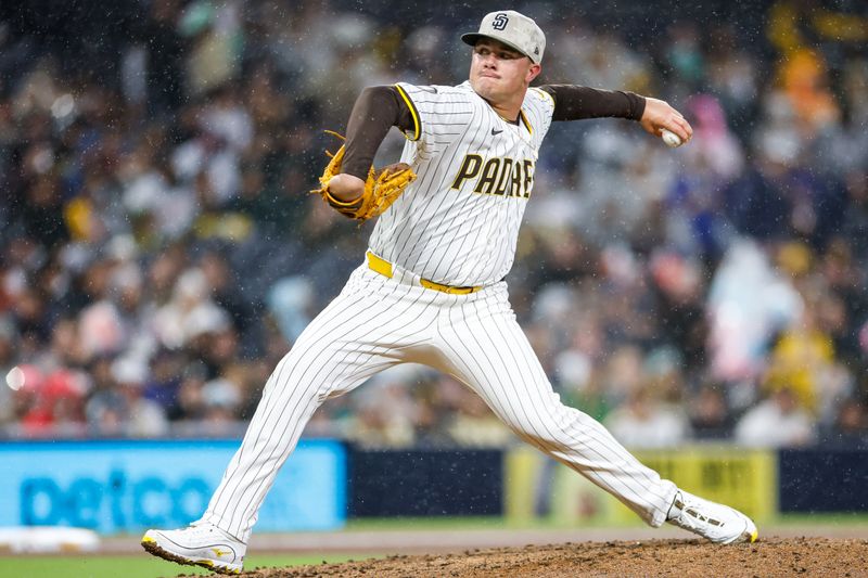 May 17, 2025; San Diego, California, USA; San Diego Padres relief pitcher Adrian Morejon (50) throws a pitch during the seventh inning against the Seattle Mariners at Petco Park. Mandatory Credit: David Frerker-Imagn Images