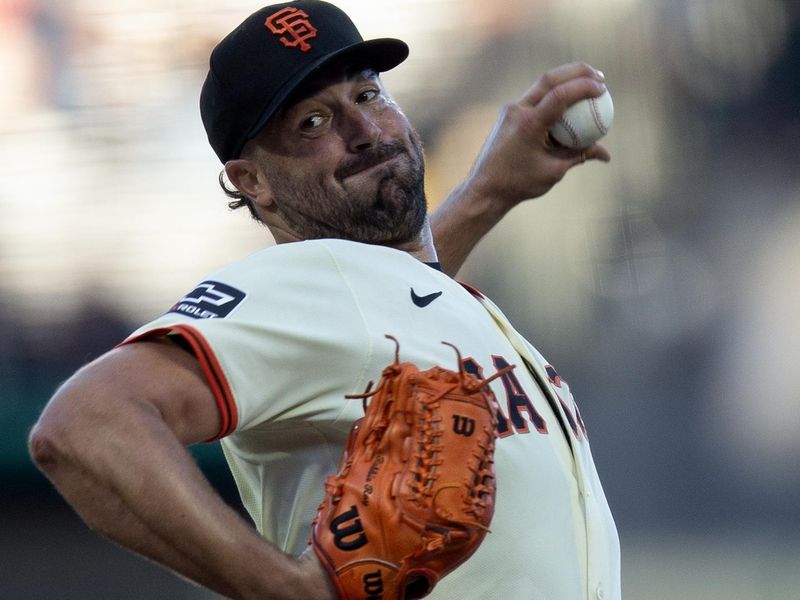 Aug 14, 2024; San Francisco, California, USA; San Francisco Giants starting pitcher Robbie Ray (23) delivers a pitch against the Atlanta Braves during the first inning at Oracle Park. Mandatory Credit: D. Ross Cameron-USA TODAY Sports