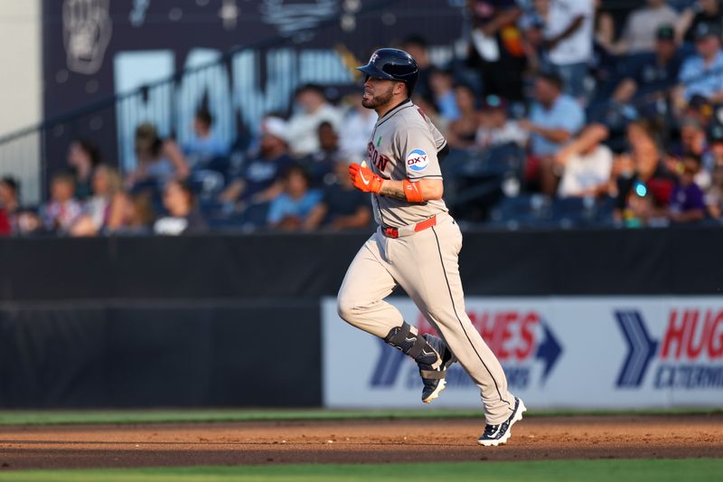 May 19, 2025; Tampa, Florida, USA; Houston Astros catcher Victor Caratini (17) runs the bases after hitting a home run against the Tampa Bay Rays in the second inning at George M. Steinbrenner Field. Mandatory Credit: Nathan Ray Seebeck-Imagn Images