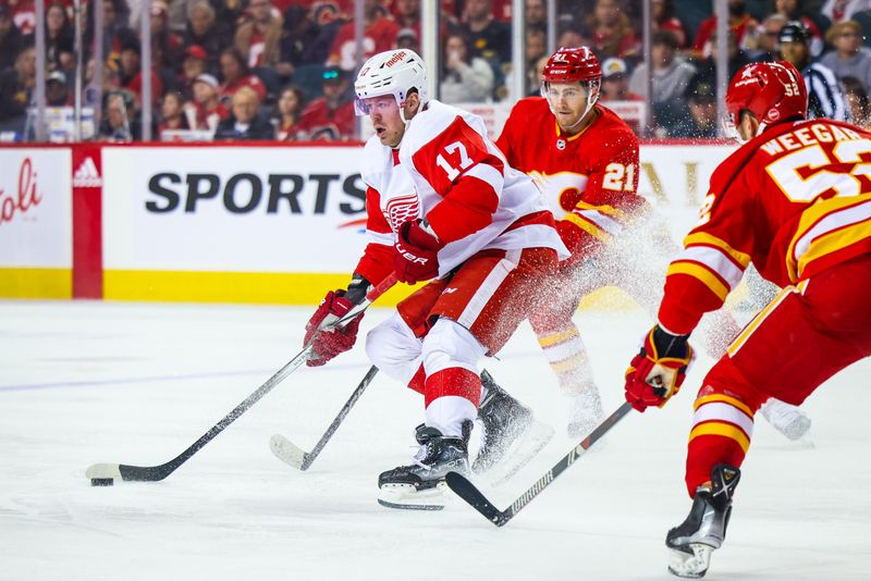 Feb 17, 2024; Calgary, Alberta, CAN; Detroit Red Wings right wing Daniel Sprong (17) controls the puck against the Calgary Flames during the second period at Scotiabank Saddledome. Mandatory Credit: Sergei Belski-USA TODAY Sports