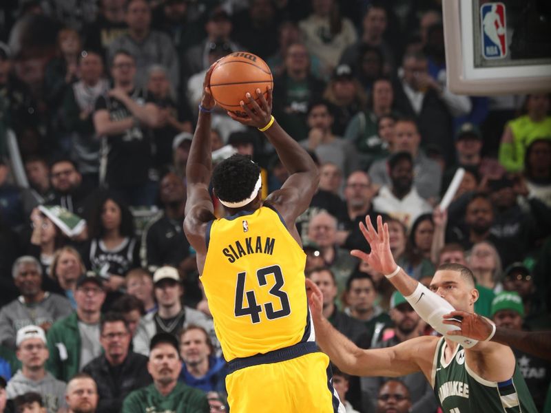 MILWAUKEE, WI - APRIL 21: Pascal Siakam #43 of the Indiana Pacers shoots the ball during the game against the Milwaukee Bucks during Round 1 Game 1 of the 2024 NBA Playoffs on April 21, 2024 at the Fiserv Forum Center in Milwaukee, Wisconsin. NOTE TO USER: User expressly acknowledges and agrees that, by downloading and or using this Photograph, user is consenting to the terms and conditions of the Getty Images License Agreement. Mandatory Copyright Notice: Copyright 2024 NBAE (Photo by Gary Dineen/NBAE via Getty Images).