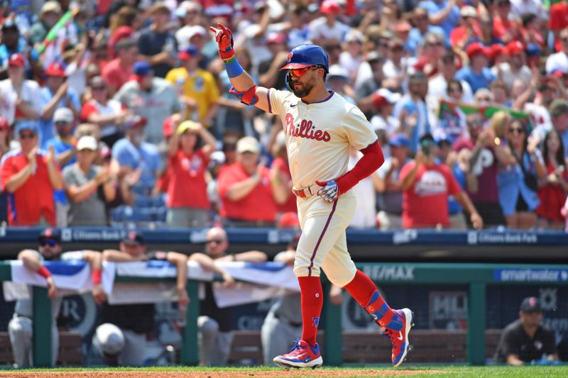 Jul 28, 2024; Philadelphia, Pennsylvania, USA; Philadelphia Phillies designated hitter Kyle Schwarber (12) celebrates his home run against the Cleveland Guardians during the third inning at Citizens Bank Park. Mandatory Credit: Eric Hartline-USA TODAY Sports