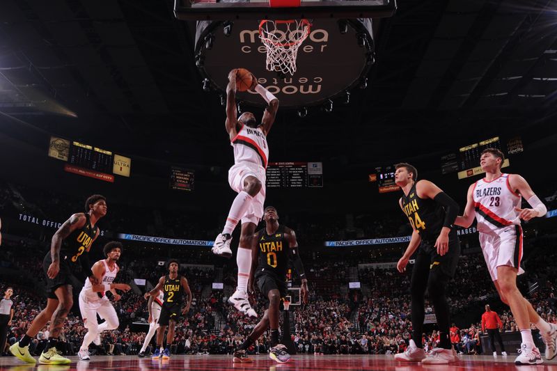 PORTLAND, OR - OCTOBER 18: Jerami Grant #9 of the Portland Trail Blazers drives to the basket during the game against the Utah Jazz on October 18, 2024 at the Moda Center Arena in Portland, Oregon. NOTE TO USER: User expressly acknowledges and agrees that, by downloading and or using this photograph, user is consenting to the terms and conditions of the Getty Images License Agreement. Mandatory Copyright Notice: Copyright 2024 NBAE (Photo by Cameron Browne/NBAE via Getty Images)