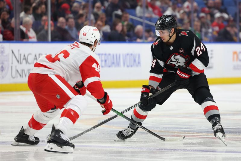 Mar 12, 2024; Buffalo, New York, USA;  Buffalo Sabres center Dylan Cozens (24) carries the puck up ice as Detroit Red Wings defenseman Jeff Petry (46) defends during the second period at KeyBank Center. Mandatory Credit: Timothy T. Ludwig-USA TODAY Sports