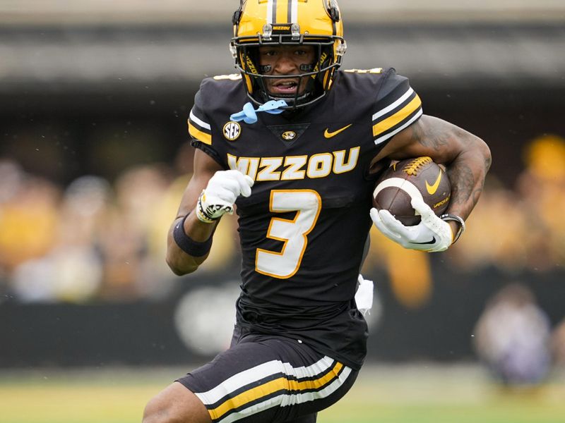 Sep 16, 2023; Columbia, Missouri, USA; Missouri Tigers wide receiver Luther Burden III (3) runs with the ball during the first half against the Kansas State Wildcats at Faurot Field at Memorial Stadium. Mandatory Credit: Jay Biggerstaff-USA TODAY Sports