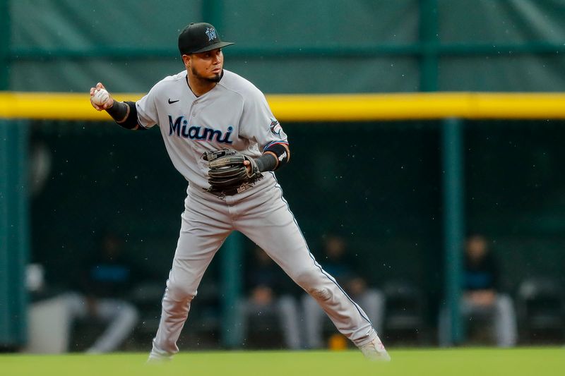 Aug 8, 2023; Cincinnati, Ohio, USA; Miami Marlins second baseman Luis Arraez (3) throws to first to get Cincinnati Reds shortstop Elly De La Cruz (not pictured) out in the fifth inning at Great American Ball Park. Mandatory Credit: Katie Stratman-USA TODAY Sports