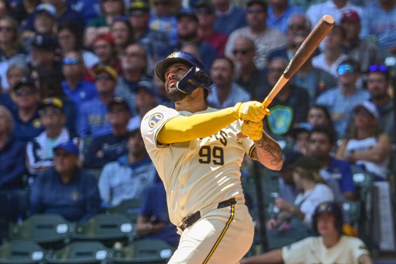 May 15, 2024; Milwaukee, Wisconsin, USA; Milwaukee Brewers catcher Gary Sanchez (99) hits a 2-run home run in the third inning against the Pittsburgh Pirates at American Family Field. Mandatory Credit: Benny Sieu-USA TODAY Sports