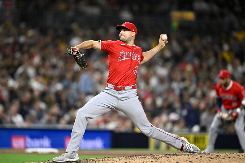 May 12, 2025; San Diego, California, USA; Los Angeles Angels relief pitcher Brock Burke (46) delivers during the eighth inning against the San Diego Padres at Petco Park. Mandatory Credit: Denis Poroy-Imagn Images