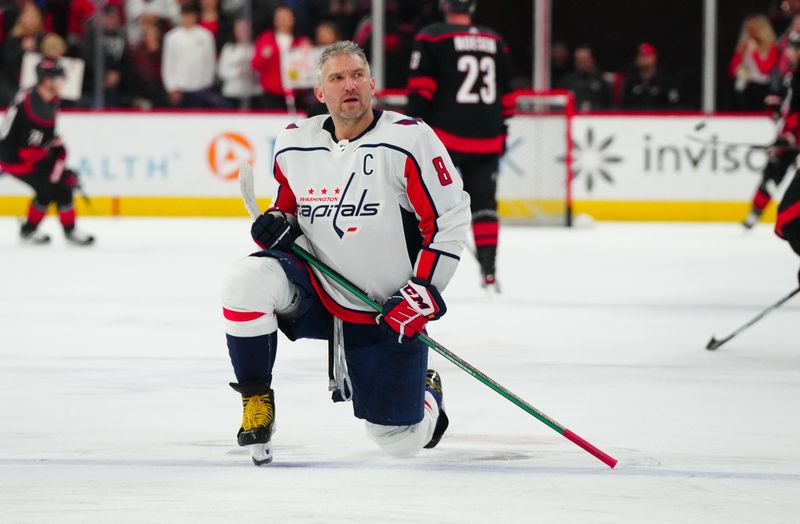 Apr 5, 2024; Raleigh, North Carolina, USA; Washington Capitals left wing Alex Ovechkin (8) looks on during the warmups before the game against the Carolina Hurricanes at PNC Arena. Mandatory Credit: James Guillory-USA TODAY Sports