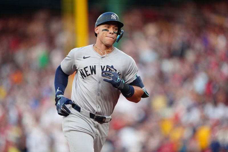 Jul 27, 2024; Boston, Massachusetts, USA; New York Yankees designated hitter Aaron Judge (99) rounds the bases after hitting a home run against the Boston Red Sox during the first inning at Fenway Park. Mandatory Credit: Gregory Fisher-USA TODAY Sports