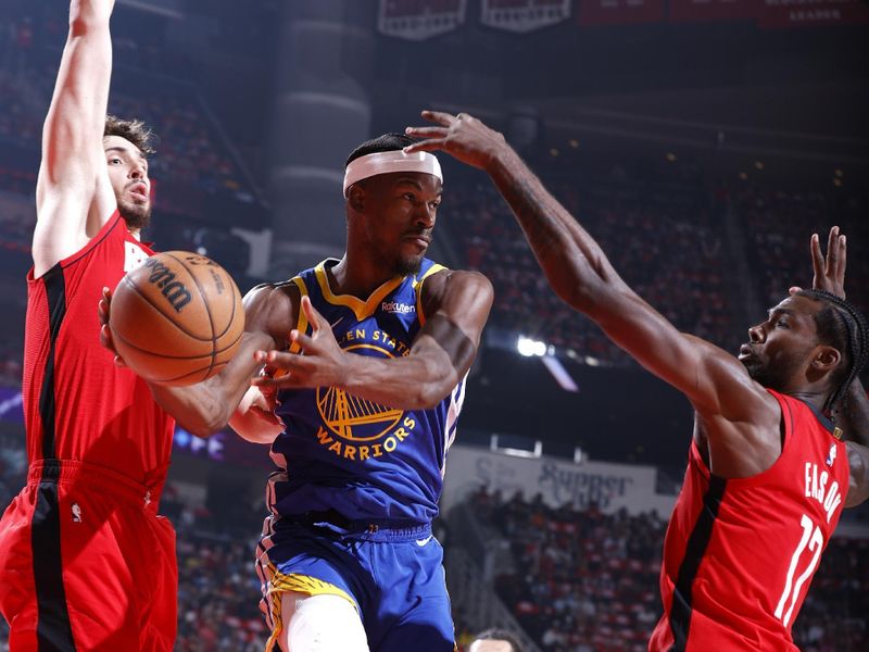 HOUSTON, TX - APRIL 30: Jimmy Butler #10 of the Golden State Warriors passes the ball during the game against the Houston Rockets during Round 1 Game 5 of the 2025 NBA Playoffs on April 30, 2025 at the Toyota Center in Houston, Texas. NOTE TO USER: User expressly acknowledges and agrees that, by downloading and or using this photograph, User is consenting to the terms and conditions of the Getty Images License Agreement. Mandatory Copyright Notice: Copyright 2025 NBAE(Photo by Logan Riely/NBAE via Getty Images)