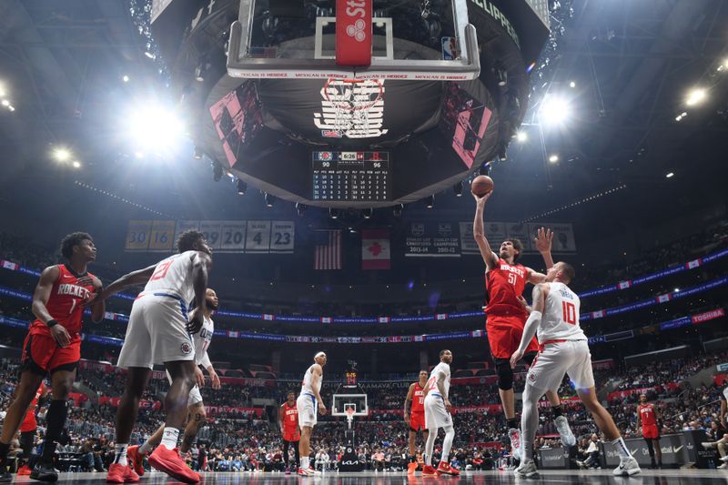 LOS ANGELES, CA - APIRL 14: Boban Marjanovic #51 of the Houston Rockets shoots the ball during the game against the LA Clippers on April 14, 2024 at Crypto.Com Arena in Los Angeles, California. NOTE TO USER: User expressly acknowledges and agrees that, by downloading and/or using this Photograph, user is consenting to the terms and conditions of the Getty Images License Agreement. Mandatory Copyright Notice: Copyright 2024 NBAE (Photo by Adam Pantozzi/NBAE via Getty Images)