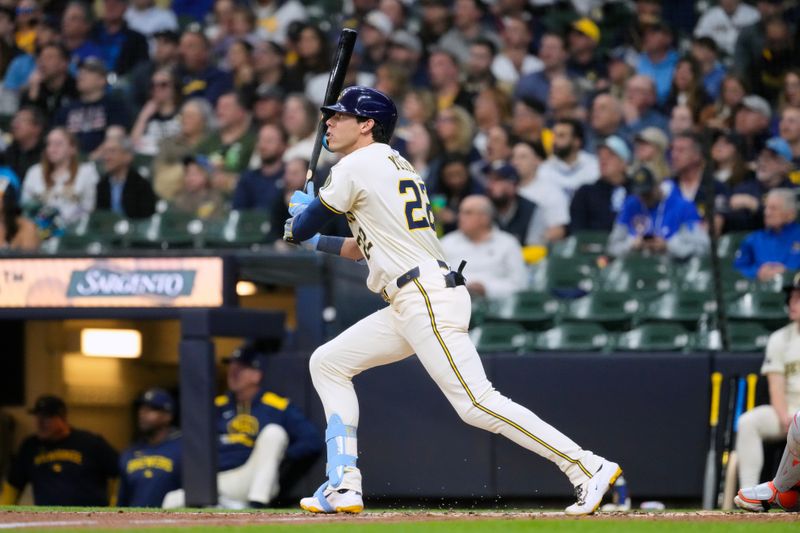 May 5, 2025; Milwaukee, Wisconsin, USA;  Milwaukee Brewers designated hitter Christian Yelich (22) hits a home run during the third inning against the Houston Astros at American Family Field. Mandatory Credit: Jeff Hanisch-Imagn Images