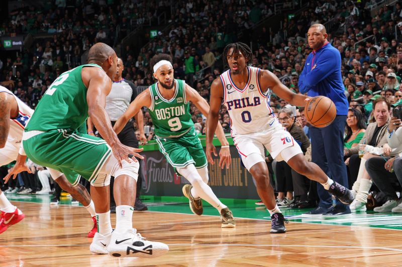 BOSTON, MA - MAY 3: Tyrese Maxey #0 of the Philadelphia 76ers dribbles the ball during Round 2 Game 2 of the Eastern Conference Semi-Finals 2023 NBA Playoffs against the Boston Celtics on May 3, 2023 at the TD Garden in Boston, Massachusetts. NOTE TO USER: User expressly acknowledges and agrees that, by downloading and or using this photograph, User is consenting to the terms and conditions of the Getty Images License Agreement. Mandatory Copyright Notice: Copyright 2023 NBAE  (Photo by Jesse D. Garrabrant/NBAE via Getty Images)