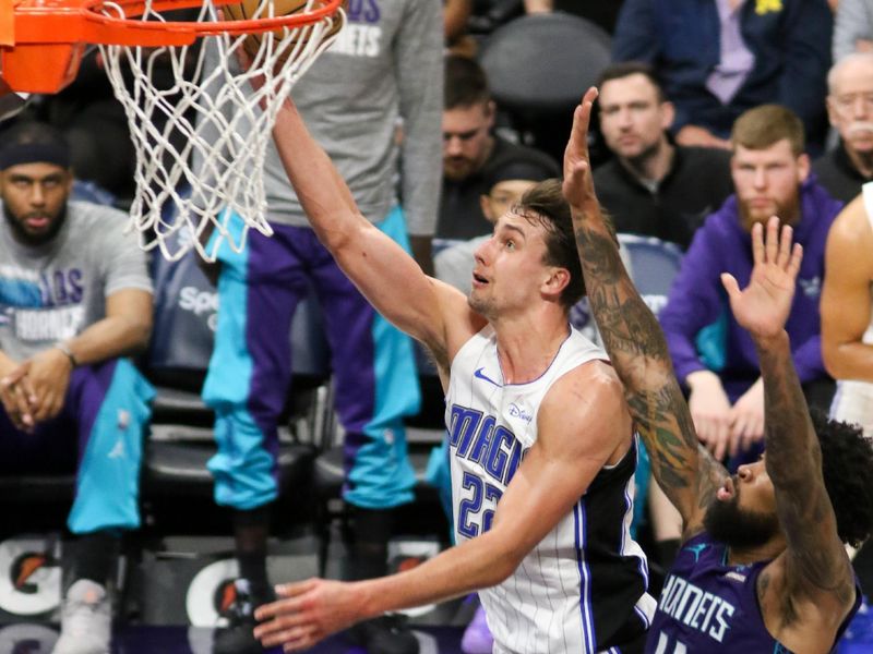 CHARLOTTE, NC - MARCH 5: Franz Wagner #22 of the Orlando Magic drives to the basket during the game against the Charlotte Hornets on March 5, 2024 at Spectrum Center in Charlotte, North Carolina. NOTE TO USER: User expressly acknowledges and agrees that, by downloading and or using this photograph, User is consenting to the terms and conditions of the Getty Images License Agreement.  Mandatory Copyright Notice:  Copyright 2024 NBAE (Photo by Brock Williams-Smith/NBAE via Getty Images)