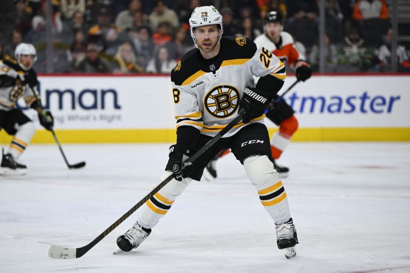 Nov 2, 2024; Philadelphia, Pennsylvania, USA; Boston Bruins center Elias Lindholm (28) in action against the Philadelphia Flyers in the first period at Wells Fargo Center. Mandatory Credit: Kyle Ross-Imagn Images