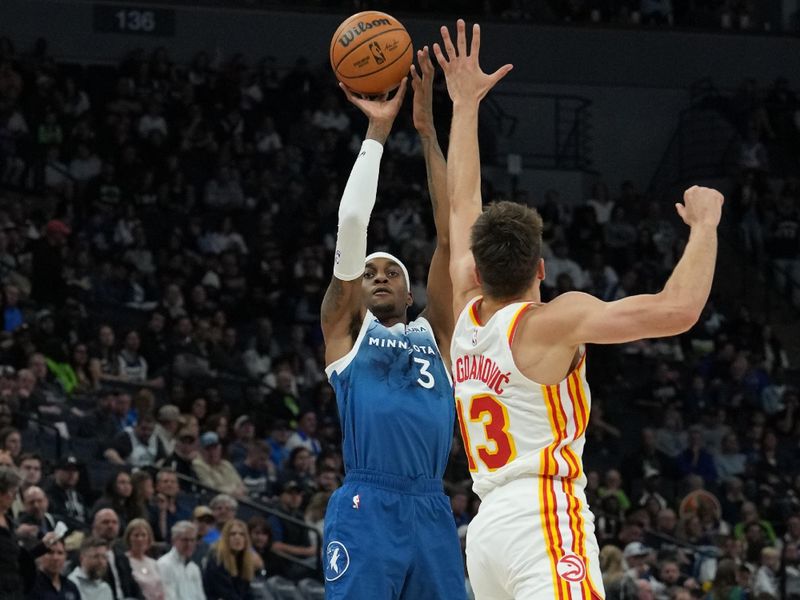 MINNEAPOLIS, MN -  APRIL 12: Jaden McDaniels #3 of the Minnesota Timberwolves shoots the ball during the game against the Atlanta Hawks on April 12, 2024 at Target Center in Minneapolis, Minnesota. NOTE TO USER: User expressly acknowledges and agrees that, by downloading and or using this Photograph, user is consenting to the terms and conditions of the Getty Images License Agreement. Mandatory Copyright Notice: Copyright 2024 NBAE (Photo by Jordan Johnson/NBAE via Getty Images)