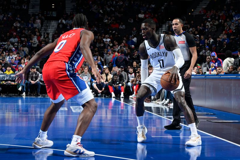 PHILADELPHIA, PA - NOVEMBER 22: Dennis Schroder #17 of the Brooklyn Nets dribbles the ball during the game against the Philadelphia 76ers during the Emirates NBA Cup game on November 22, 2024 at the Wells Fargo Center in Philadelphia, Pennsylvania NOTE TO USER: User expressly acknowledges and agrees that, by downloading and/or using this Photograph, user is consenting to the terms and conditions of the Getty Images License Agreement. Mandatory Copyright Notice: Copyright 2024 NBAE (Photo by David Dow/NBAE via Getty Images)