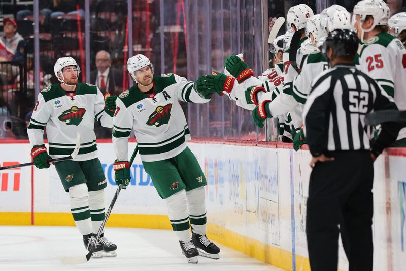 Mar 26, 2026; Sunrise, Florida, USA; Minnesota Wild left wing Marcus Foligno (17) celebrates after scoring against the Florida Panthers during the second period at Amerant Bank Arena. Mandatory Credit: Sam Navarro-Imagn Images