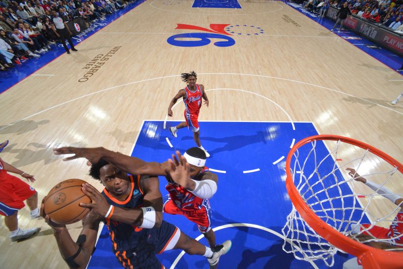 PHILADELPHIA, PA - APRIL 28: OG Anunoby #8 of the New York Knicks drives to the basket during the game against the Philadelphia 76ers during Round 1 Game 4 of the 2024 NBA Playoffs on April 28, 2024 at the Wells Fargo Center in Philadelphia, Pennsylvania NOTE TO USER: User expressly acknowledges and agrees that, by downloading and/or using this Photograph, user is consenting to the terms and conditions of the Getty Images License Agreement. Mandatory Copyright Notice: Copyright 2024 NBAE (Photo by Jesse D. Garrabrant/NBAE via Getty Images)