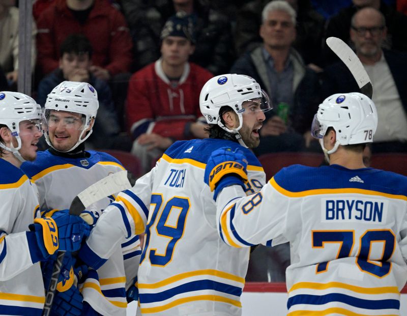 Feb 21, 2024; Montreal, Quebec, CAN; Buffalo Sabres forward Alex Tuch (89) celebrates with teammates after scoring a goal against the Montreal Canadiens during the second period at the Bell Centre. Mandatory Credit: Eric Bolte-USA TODAY Sports