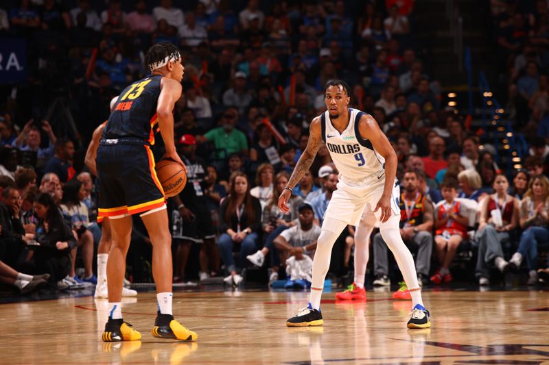 OKLAHOMA CITY, OK - APRIL 14:  AJ Lawson #9 of the Dallas Mavericks plays defense during the game against the Oklahoma City Thunder on April 14, 2024 at Paycom Arena in Oklahoma City, Oklahoma. NOTE TO USER: User expressly acknowledges and agrees that, by downloading and or using this photograph, User is consenting to the terms and conditions of the Getty Images License Agreement. Mandatory Copyright Notice: Copyright 2024 NBAE (Photo by Zach Beeker/NBAE via Getty Images)