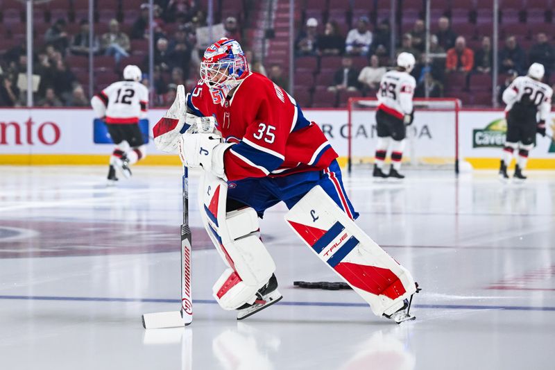 Dec 2, 2025; Montreal, Quebec, CAN; Starting goalie Montreal Canadiens Samuel Montembeault (35) skates first from his team on the ice during warm-up before the game against the Ottawa Senators at Bell Centre. Mandatory Credit: David Kirouac-Imagn Images