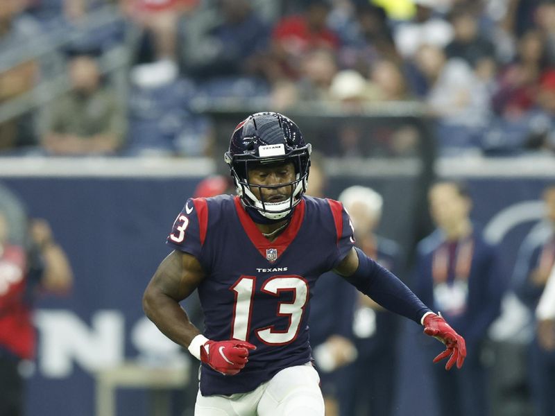 Houston Texans wide receiver Brandin Cooks (13) runs a pass route during an NFL football game against the Jacksonville Jaguars on Sunday, January 1, 2023, in Houston. (AP Photo/Matt Patterson)