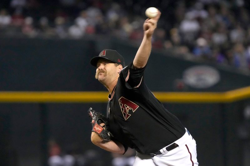 May 28, 2023; Phoenix, Arizona, USA; Arizona Diamondbacks relief pitcher Andrew Chafin (57) throws against the Boston Red Sox in the seventh inning at Chase Field. Mandatory Credit: Rick Scuteri-USA TODAY Sports