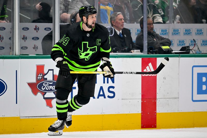 Jan 10, 2024; Dallas, Texas, USA; Dallas Stars left wing Jamie Benn (14) skates against the Minnesota Wild during the second period at the American Airlines Center. Mandatory Credit: Jerome Miron-USA TODAY Sports