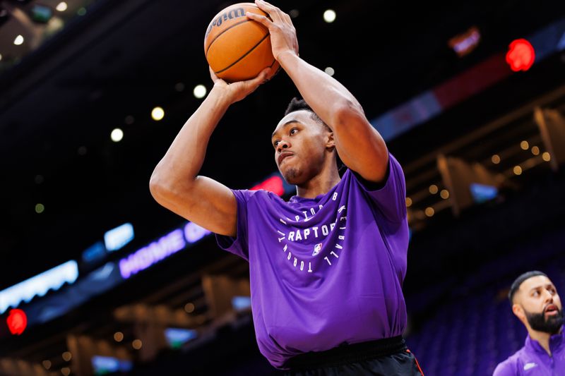 TORONTO, CANADA - OCTOBER 23: Scottie Barnes #4 of the Toronto Raptors warms up ahead of their NBA game against the Cleveland Cavaliers at Scotiabank Arena on October 23, 2024 in Toronto, Ontario, Canada. NOTE TO USER: User expressly acknowledges and agrees that, by downloading and or using this photograph, User is consenting to the terms and conditions of the Getty Images License Agreement. (Photo by Cole Burston/Getty Images)