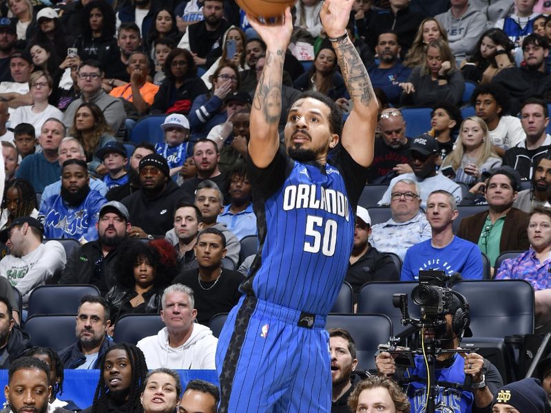 ORLANDO, FL - JANUARY 12: Cole Anthony #50 of the Orlando Magic shoots a three point basket during the game against the Philadelphia 76ers on January 12, 2025 at Kia Center in Orlando, Florida. NOTE TO USER: User expressly acknowledges and agrees that, by downloading and or using this photograph, User is consenting to the terms and conditions of the Getty Images License Agreement. Mandatory Copyright Notice: Copyright 2025 NBAE (Photo by Gary Bassing/NBAE via Getty Images)