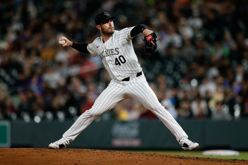 Aug 9, 2024; Denver, Colorado, USA; Colorado Rockies relief pitcher Tyler Kinley (40) pitches in the second inning against the Atlanta Braves at Coors Field. Mandatory Credit: Isaiah J. Downing-USA TODAY Sports