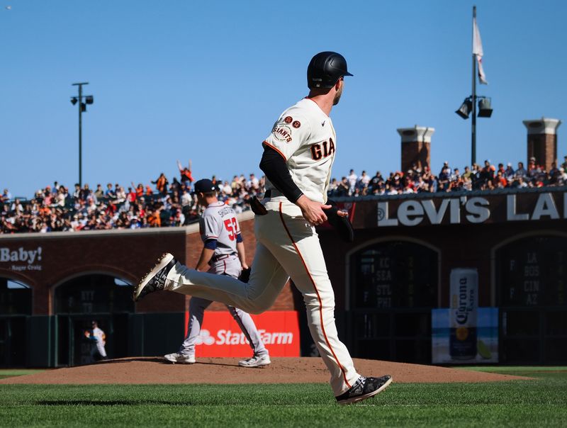 Aug 27, 2023; San Francisco, California, USA; San Francisco Giants center fielder Austin Slater (13) scores a run against Atlanta Braves starting pitcher Jared Shuster (53) during the first inning at Oracle Park. Mandatory Credit: Kelley L Cox-USA TODAY Sports