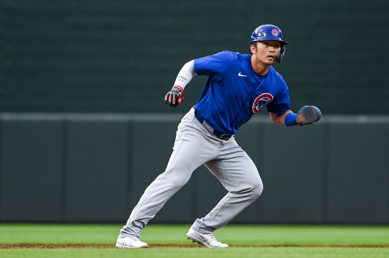 Jul 11, 2024; Baltimore, Maryland, USA;  Chicago Cubs outfielder Seiya Suzuki (27) leads off second base during the third inning against the Baltimore Orioles at Oriole Park at Camden Yards. Mandatory Credit: Tommy Gilligan-USA TODAY Sports