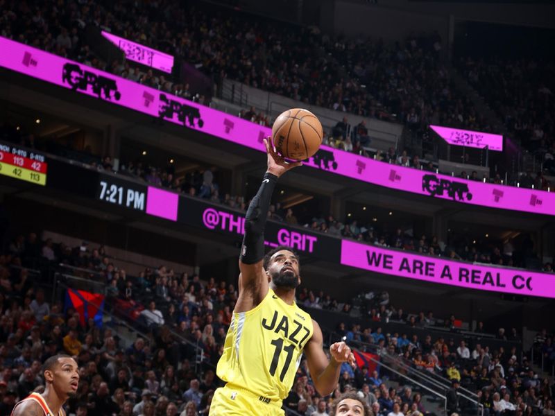 SALT LAKE CITY, UT - FEBRUARY 3: Mike Conley #11 of the Utah Jazz shoots the ball during the game against the Atlanta Hawks on February 3, 2023 at vivint.SmartHome Arena in Salt Lake City, Utah. NOTE TO USER: User expressly acknowledges and agrees that, by downloading and or using this Photograph, User is consenting to the terms and conditions of the Getty Images License Agreement. Mandatory Copyright Notice: Copyright 2023 NBAE (Photo by Melissa Majchrzak/NBAE via Getty Images)