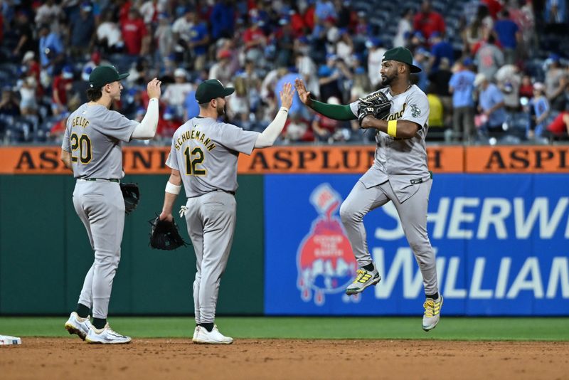 Jul 12, 2024; Philadelphia, Pennsylvania, USA; Oakland Athletics outfielder Miguel Andujar (22) celebrates with teammates after the game against the Philadelphia Phillies at Citizens Bank Park. Mandatory Credit: Kyle Ross-USA TODAY Sports