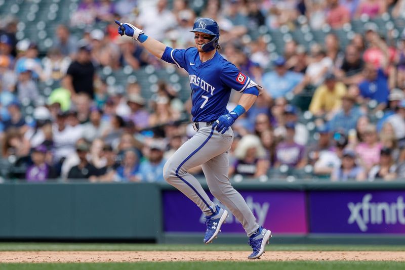 Jul 7, 2024; Denver, Colorado, USA; Kansas City Royals shortstop Bobby Witt Jr. (7) gestures on a three run home run in the ninth inning against the Colorado Rockies at Coors Field. Mandatory Credit: Isaiah J. Downing-USA TODAY Sports