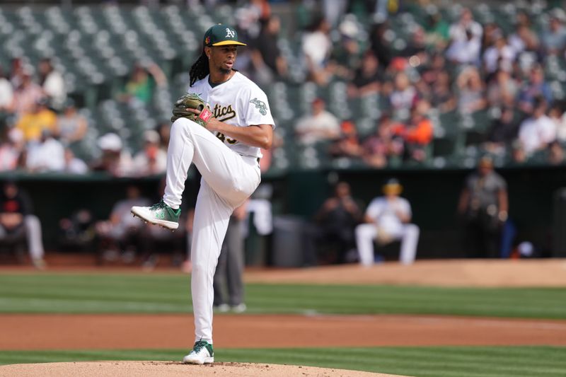 Aug 17, 2024; Oakland, California, USA; Oakland Athletics starting pitcher Osvaldo Bido (45) throws a pitch against the San Francisco Giants during the first inning at Oakland-Alameda County Coliseum. Mandatory Credit: Darren Yamashita-USA TODAY Sports