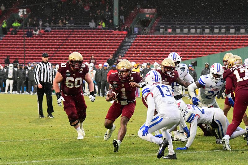 Dec 28, 2023; Boston, MA, USA; Boston College Eagles quarterback Thomas Castellanos (1) runs the ball against the Southern Methodist Mustangs during the second half at Fenway Park. Mandatory Credit: Eric Canha-USA TODAY Sports