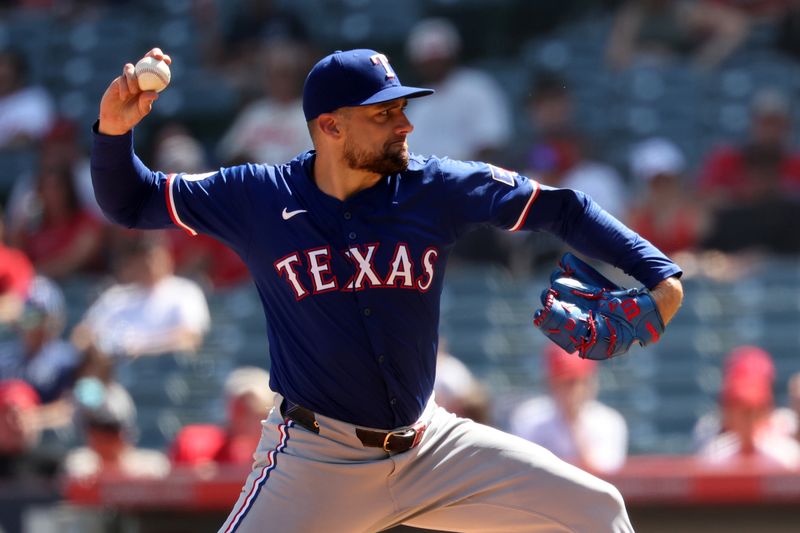 Sep 29, 2024; Anaheim, California, USA;  Texas Rangers starting pitcher Nathan Eovaldi (17) pitches during the third inning against the Los Angeles Angels at Angel Stadium. Mandatory Credit: Kiyoshi Mio-Imagn Images