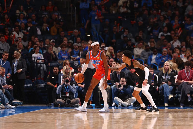 OKLAHOMA CITY, OK - JANUARY 23: Shai Gilgeous-Alexander #2 of the Oklahoma City Thunder handles the ball against defender Anfernee Simons #1 of the Portland Trail Blazers during the game on January 23, 2024 at Paycom Arena in Oklahoma City, Oklahoma. NOTE TO USER: User expressly acknowledges and agrees that, by downloading and or using this photograph, User is consenting to the terms and conditions of the Getty Images License Agreement. Mandatory Copyright Notice: Copyright 2024 NBAE (Photo by Zach Beeker/NBAE via Getty Images)